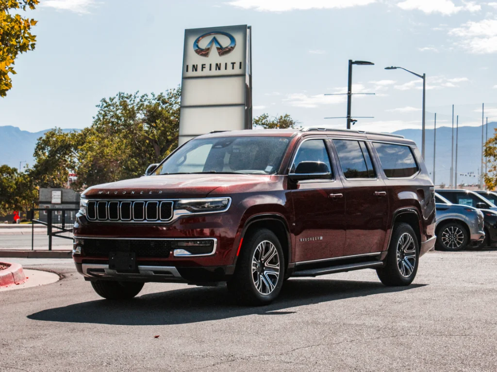 Used 2023 Velvet Red Pearl Jeep Series II image 1