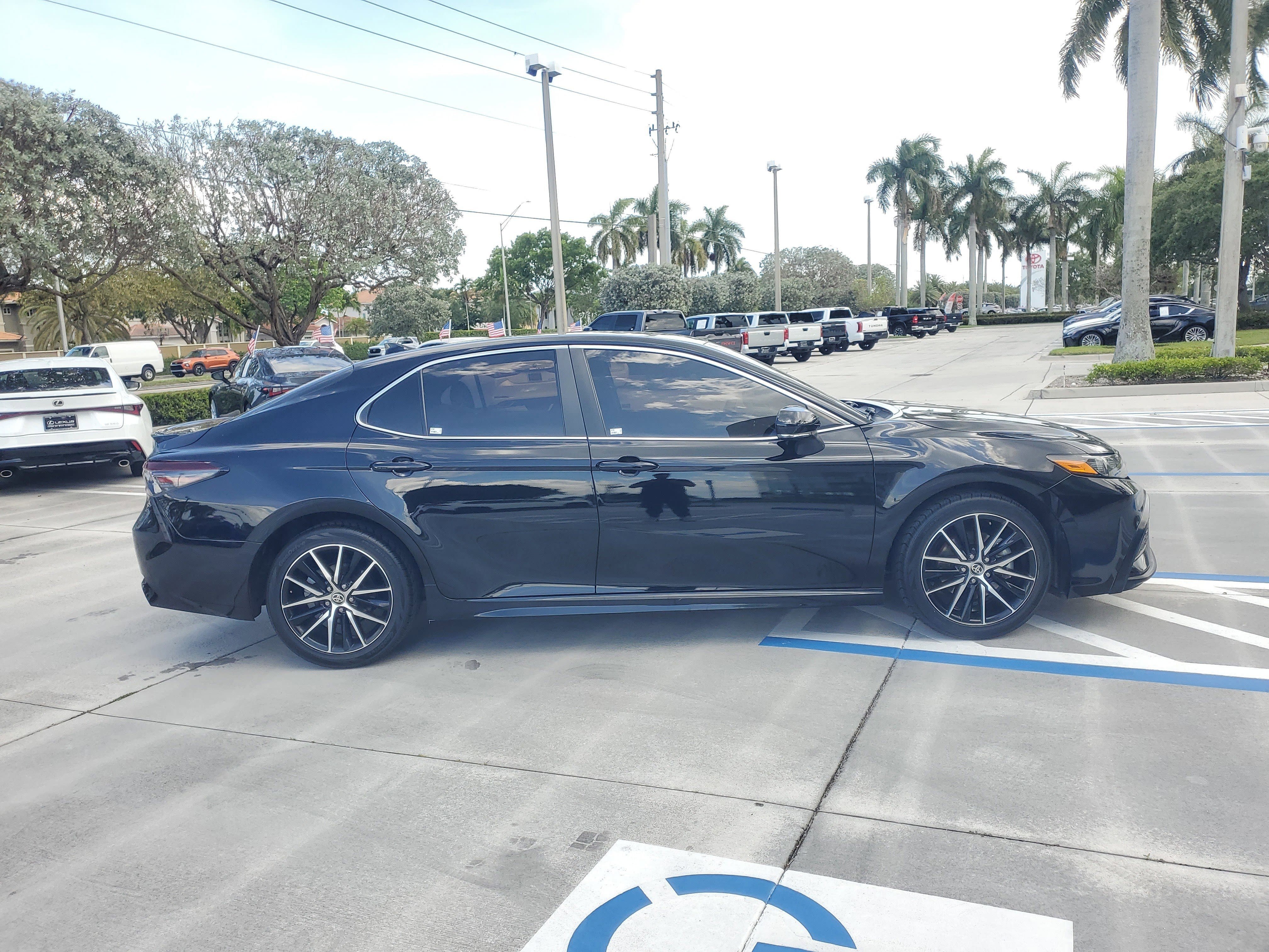 Used 2024 Midnight Black Metallic Toyota SE image 11