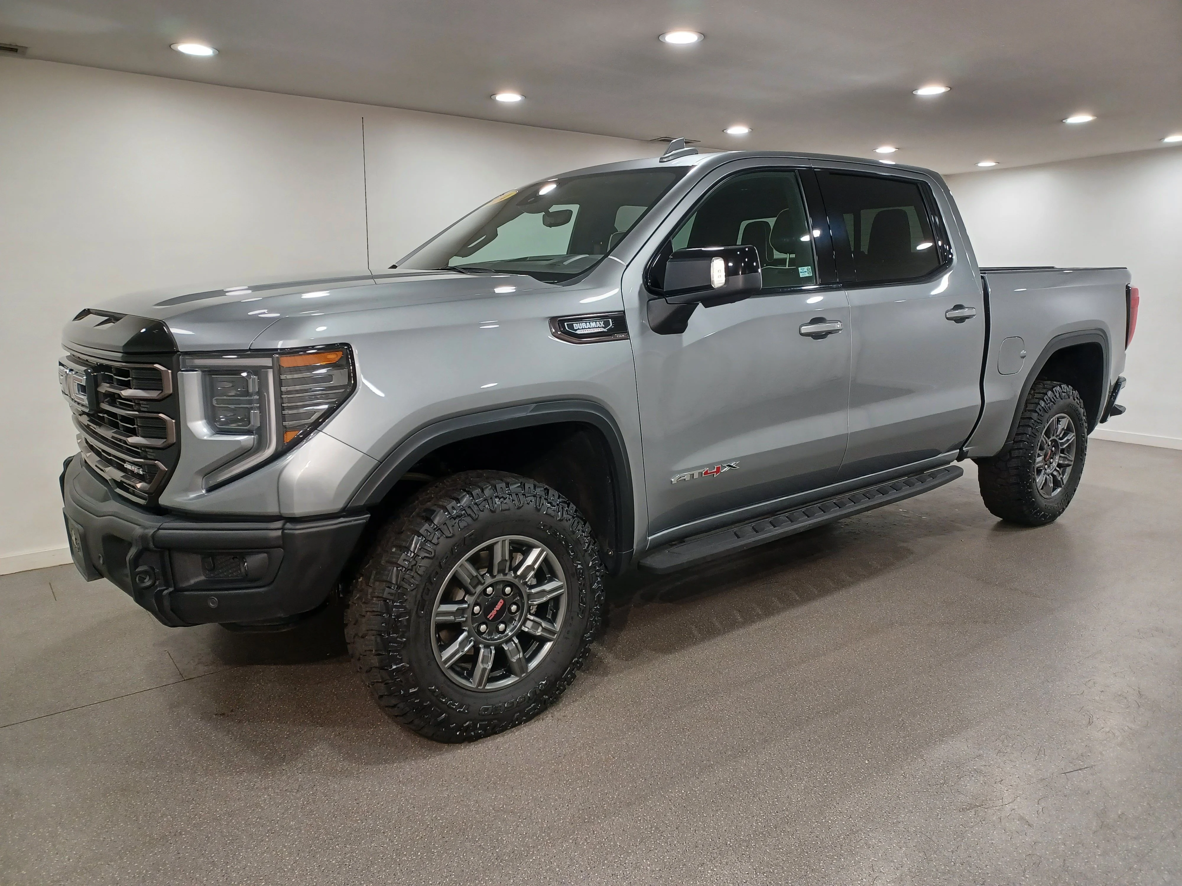 Used 2024 Sterling Metallic GMC AT4X 4WD*3.0L Duramax | Adaptive Cruise | Remote Start | Cooled Leather | Sunroof | Htd Wheel | AEV image 2