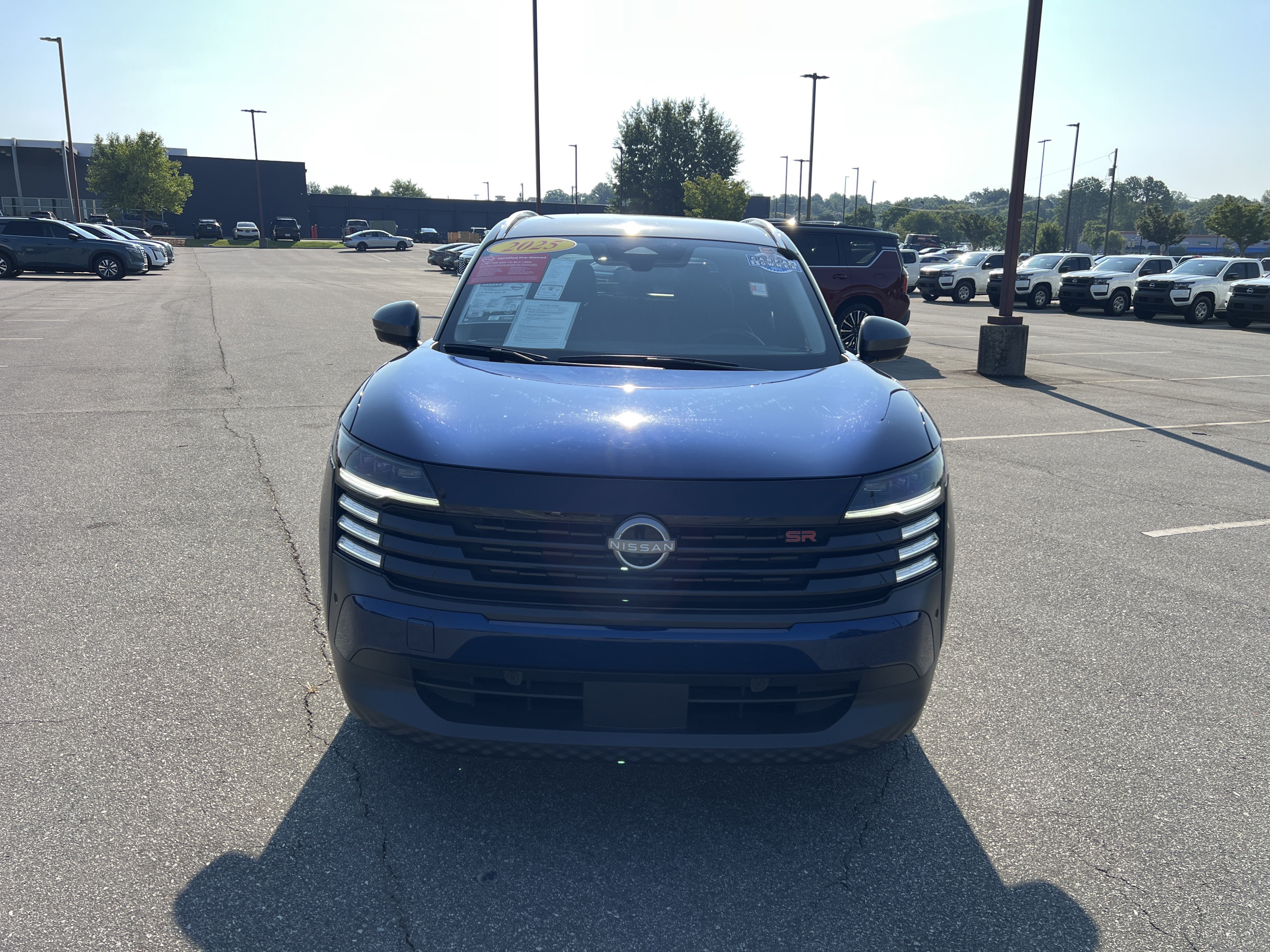 Certified Used 2025 Deep Blue Pearl/Gun Metallic Nissan SR image 2