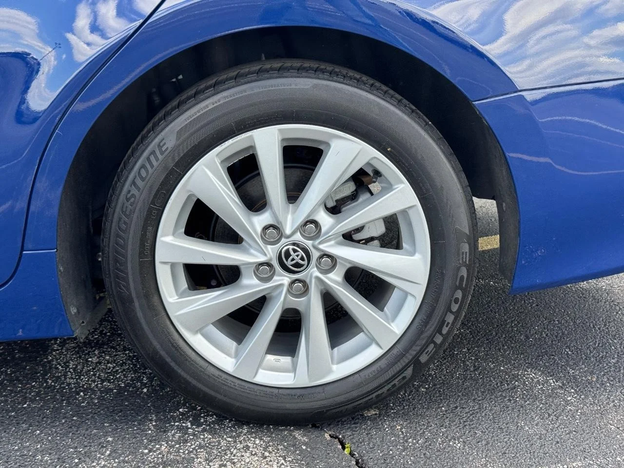 Used 2024 Reservoir Blue Toyota LE image 8