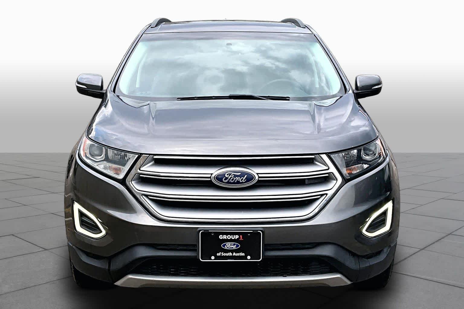 Used 2015 Magnetic Metallic Ford SEL image 6