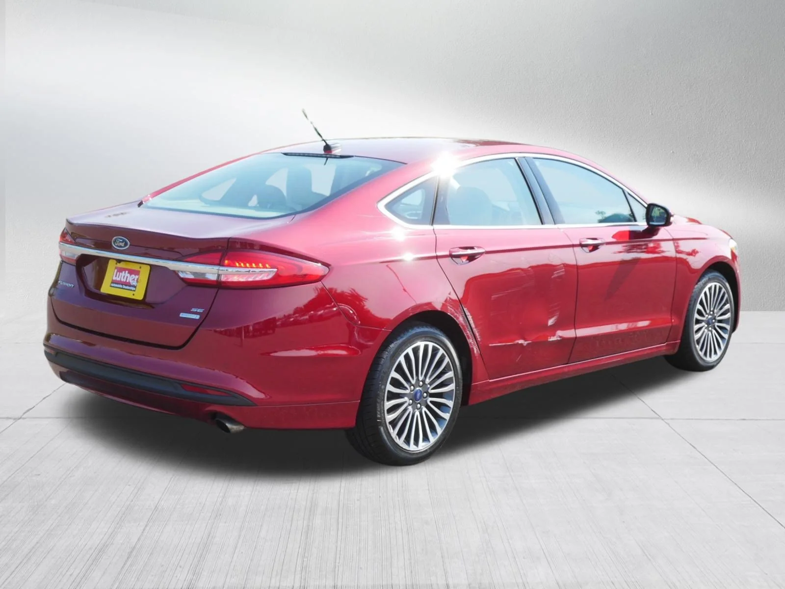 Used 2017 Ruby Red Metallic Tinted Clearcoat Ford SE image 7