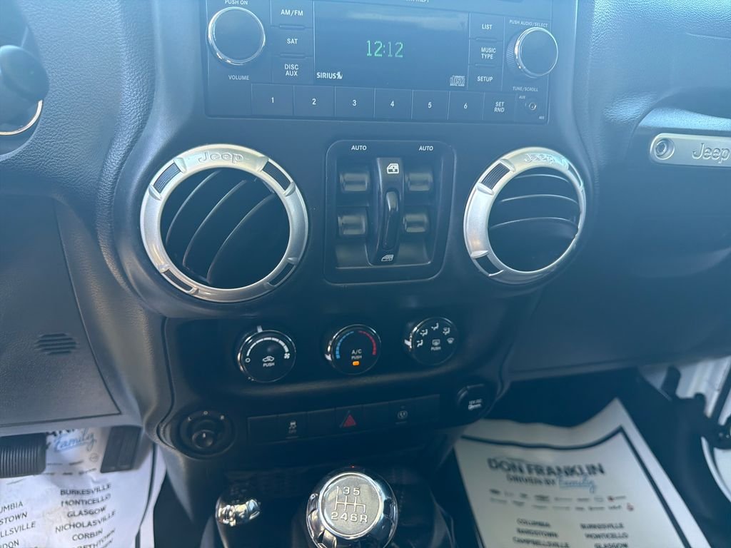 Used 2016 White Jeep Unlimited Sahara image 18