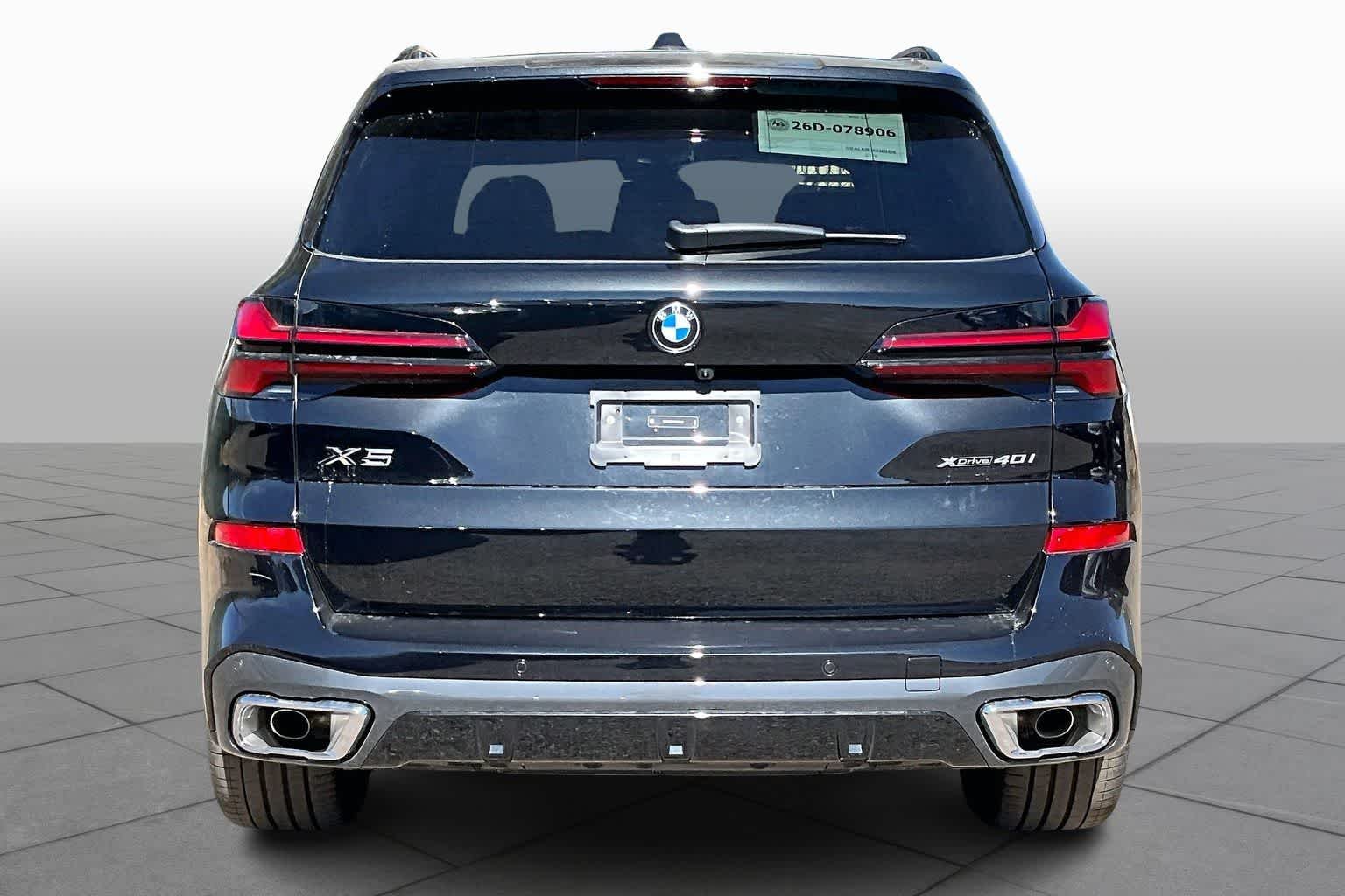 New 2026 Black Sapphire Metallic BMW xDrive40i image 4