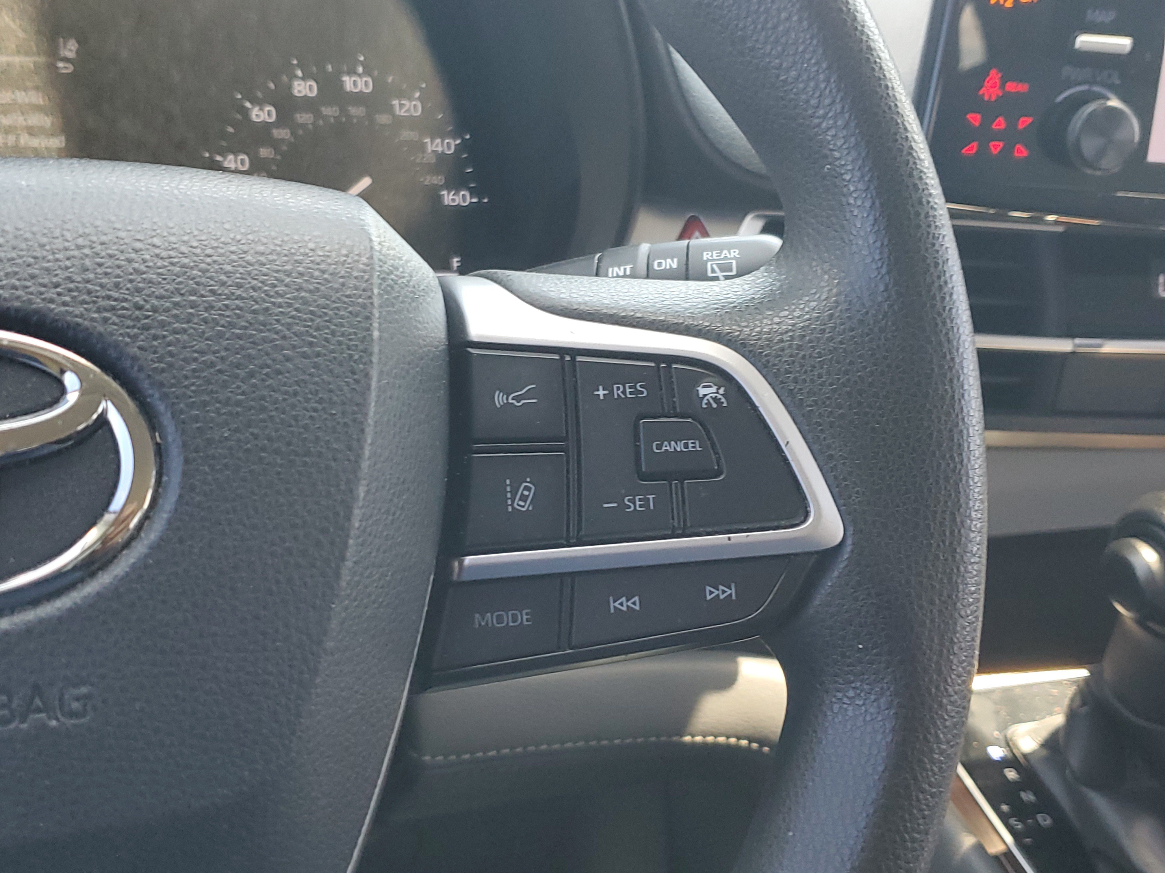 Used 2021 Sunset Bronze Toyota LE image 27