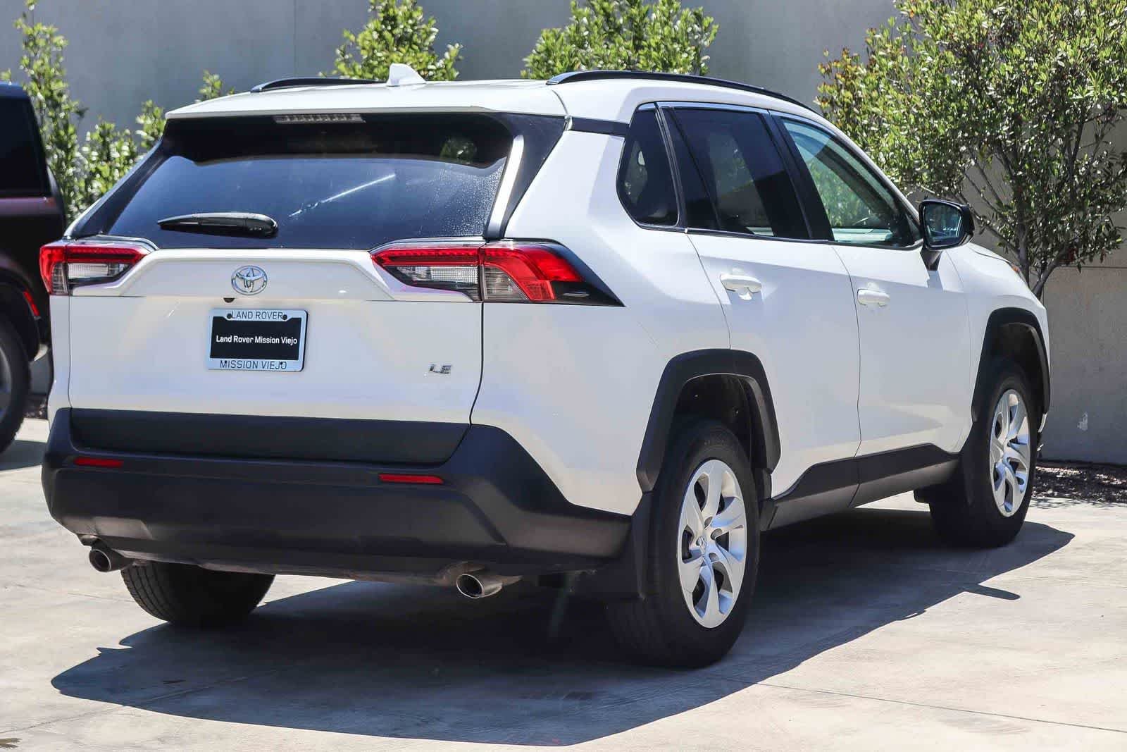 Used 2021 Super White Toyota LE image 6