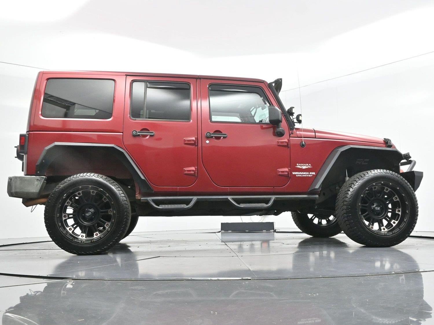 Used 2011 Deep Cherry Red Crystal Pearlcoat Jeep Sahara image 51