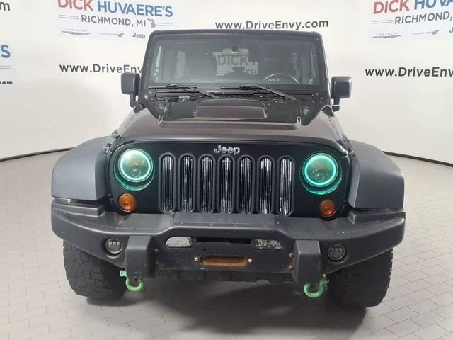 Used 2012 Jeep Wrangler Unlimited Rubicon with VIN 1C4HJWFG7CL228121 for sale in Richmond, MI