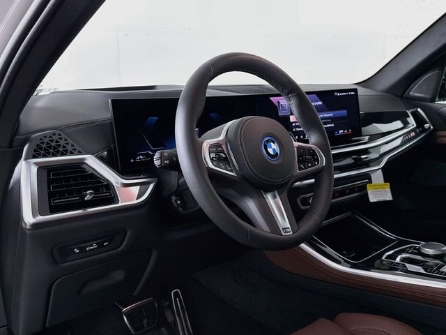 Used 2026 White Metallic BMW xDrive50e image 9
