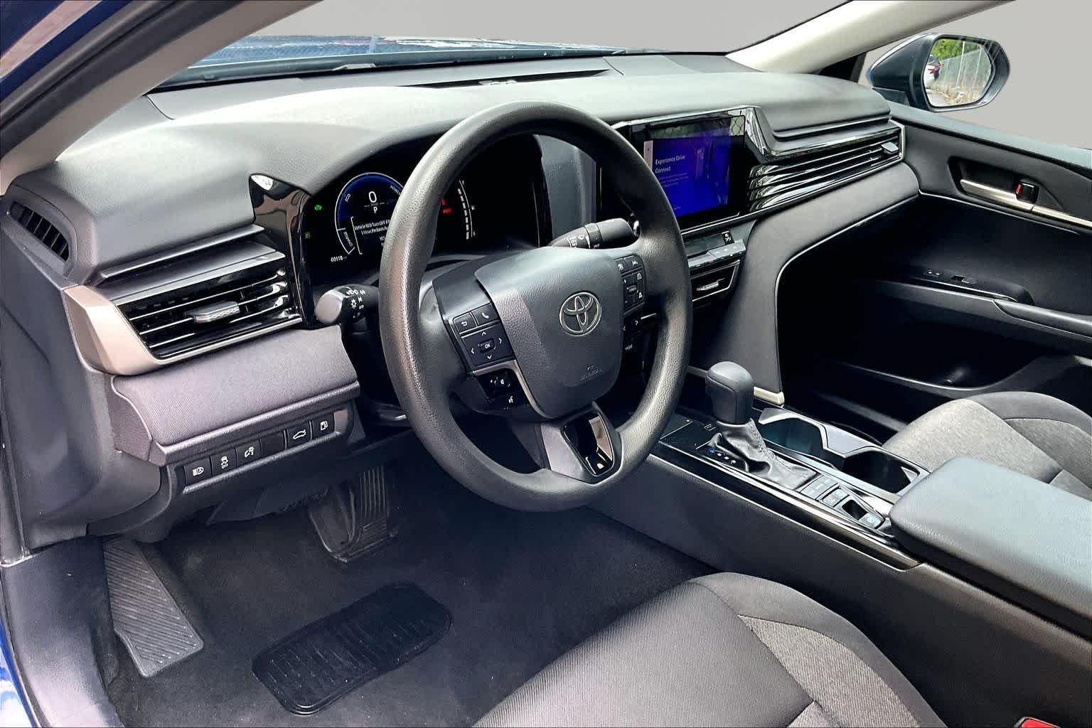 Used 2025 Reservoir Blue Toyota LE image 18