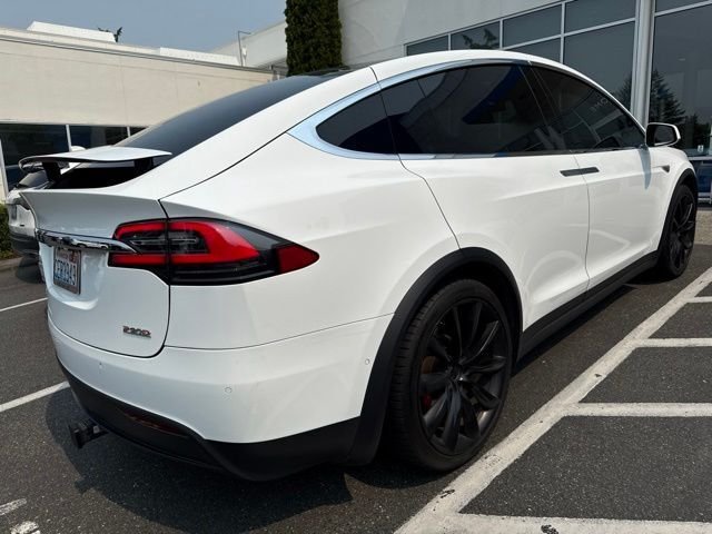 Used 2016 Solid White Tesla  image 4