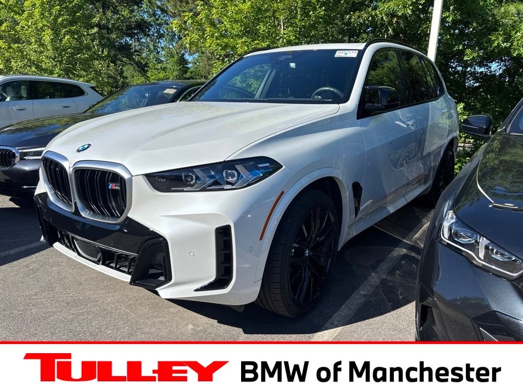 Used 2026 Mineral White Metallic BMW M60i image 1