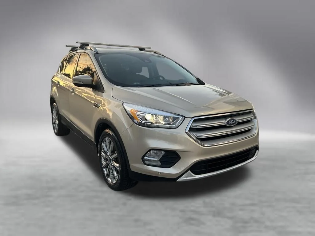 Used 2017 Ford Escape Titanium with VIN 1FMCU0J90HUE33686 for sale in Lake Worth Beach, FL