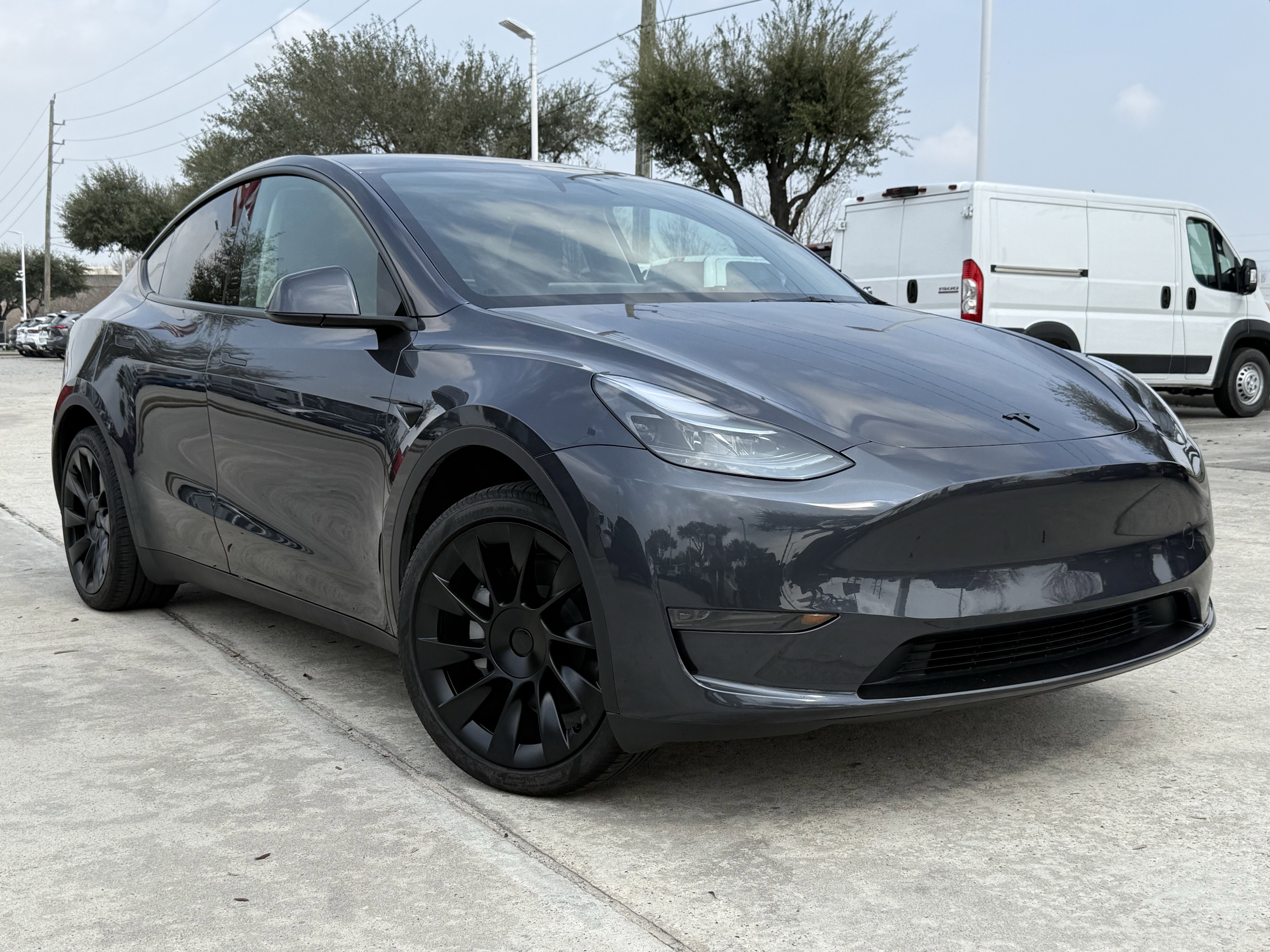 Used 2025 Tesla Model Y Long Range with VIN 7SAYGDED3SA377136 for sale in Northfield, Minnesota