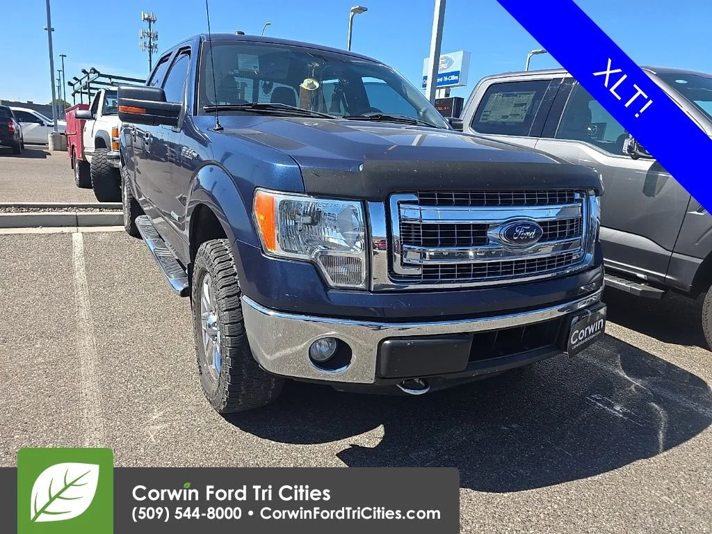 Used 2014 Blue Ford XLT image 1