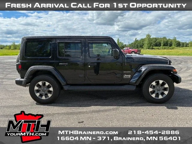 Certified Used 2023 Black Jeep Sahara image 1