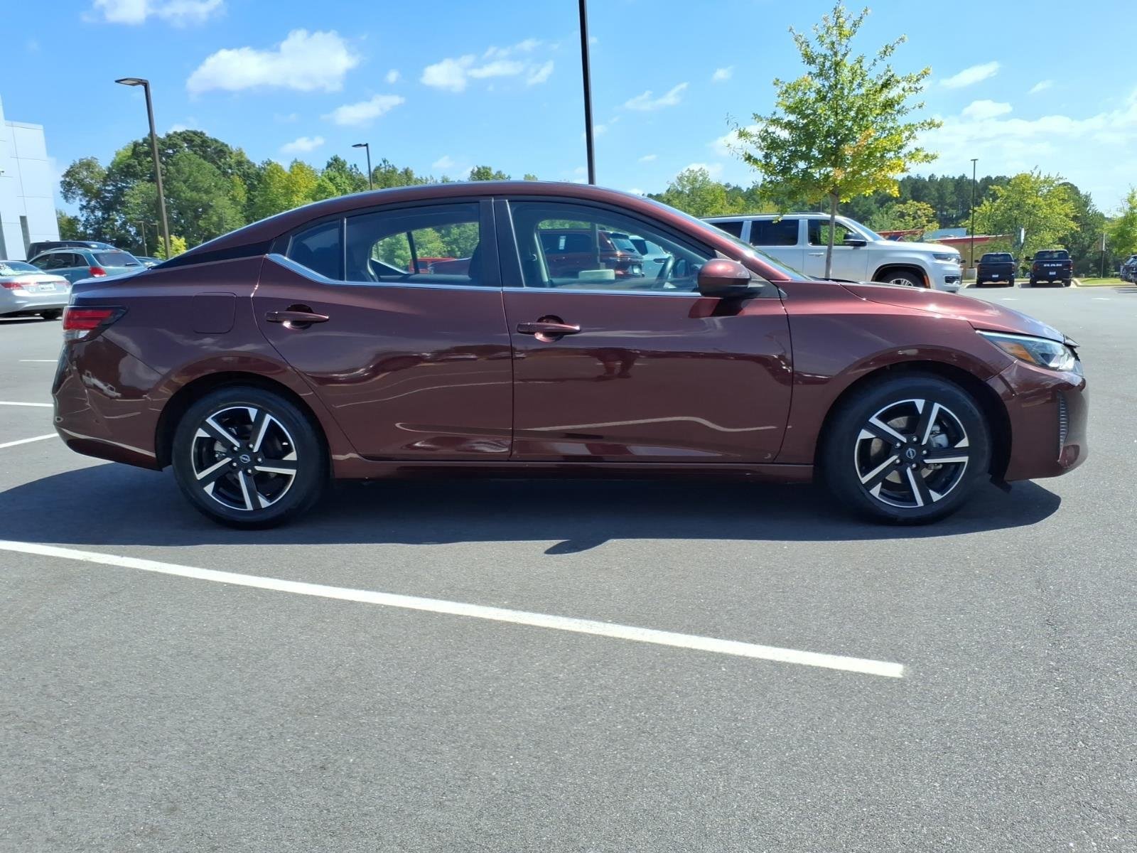 Used 2025 Rosewood Metallic Nissan SV image 10