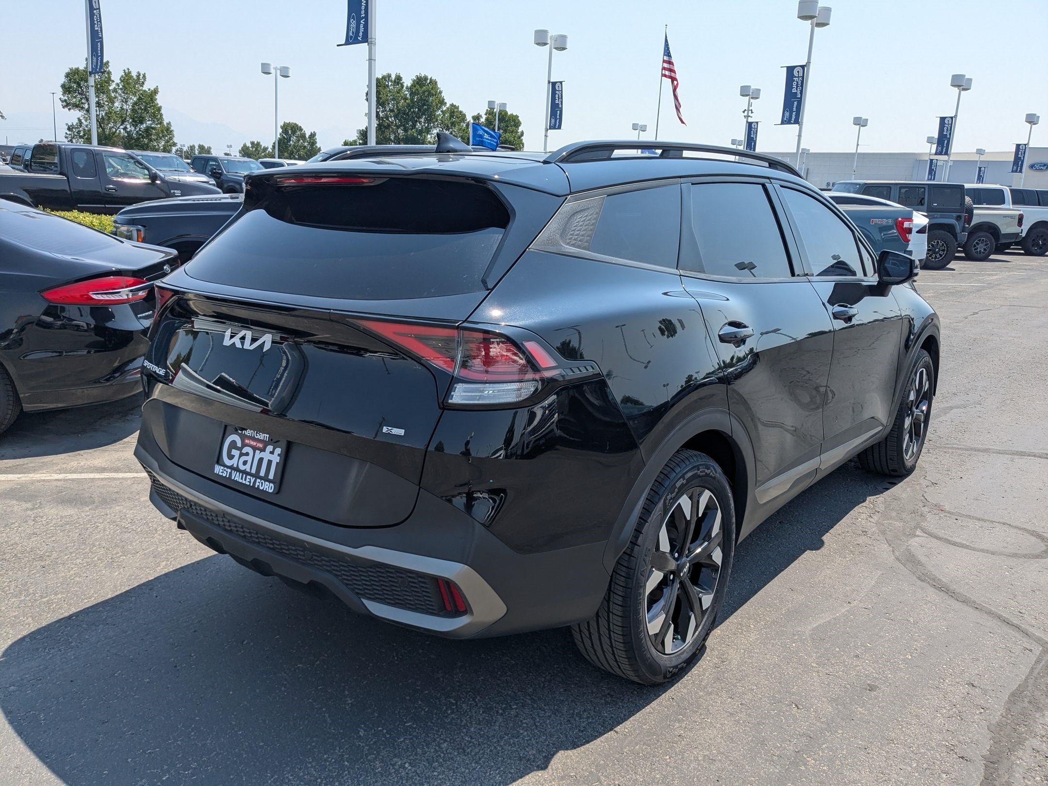 Used 2023 Ebony Black Kia X-Line image 3