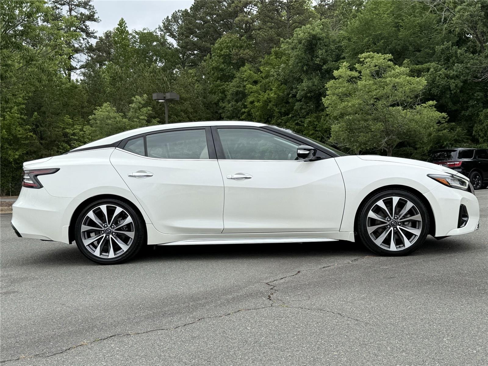 Used 2023 Pearl White Tricoat Nissan Platinum image 28