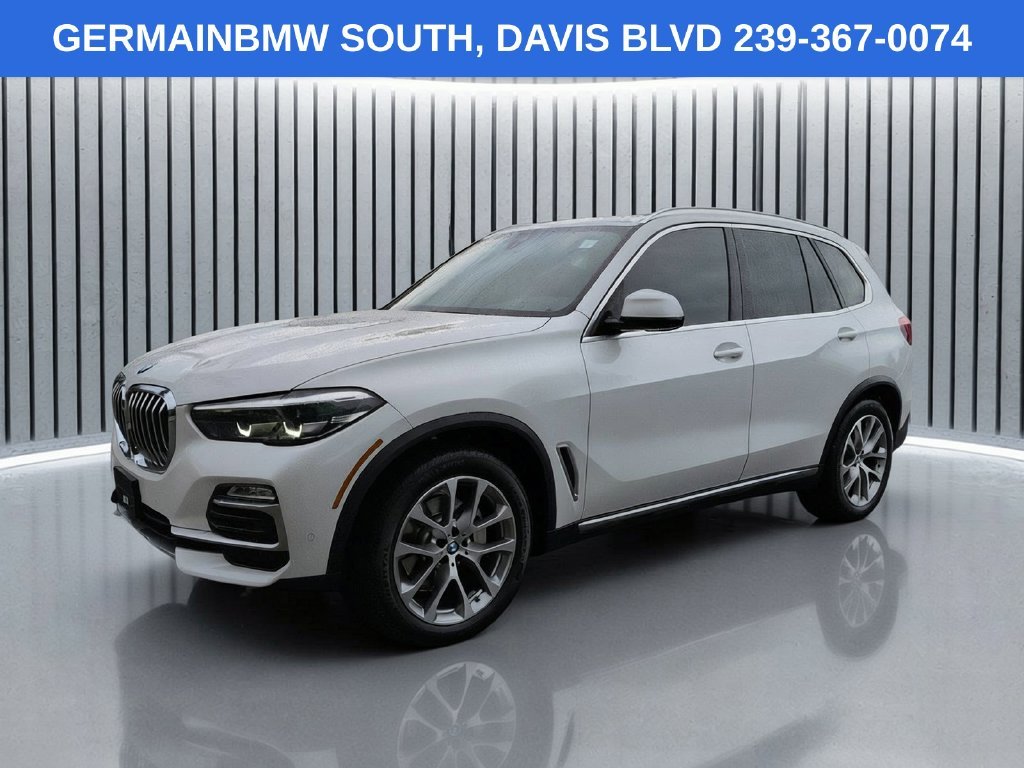 Used 2021 White Metallic BMW sDrive40i image 1