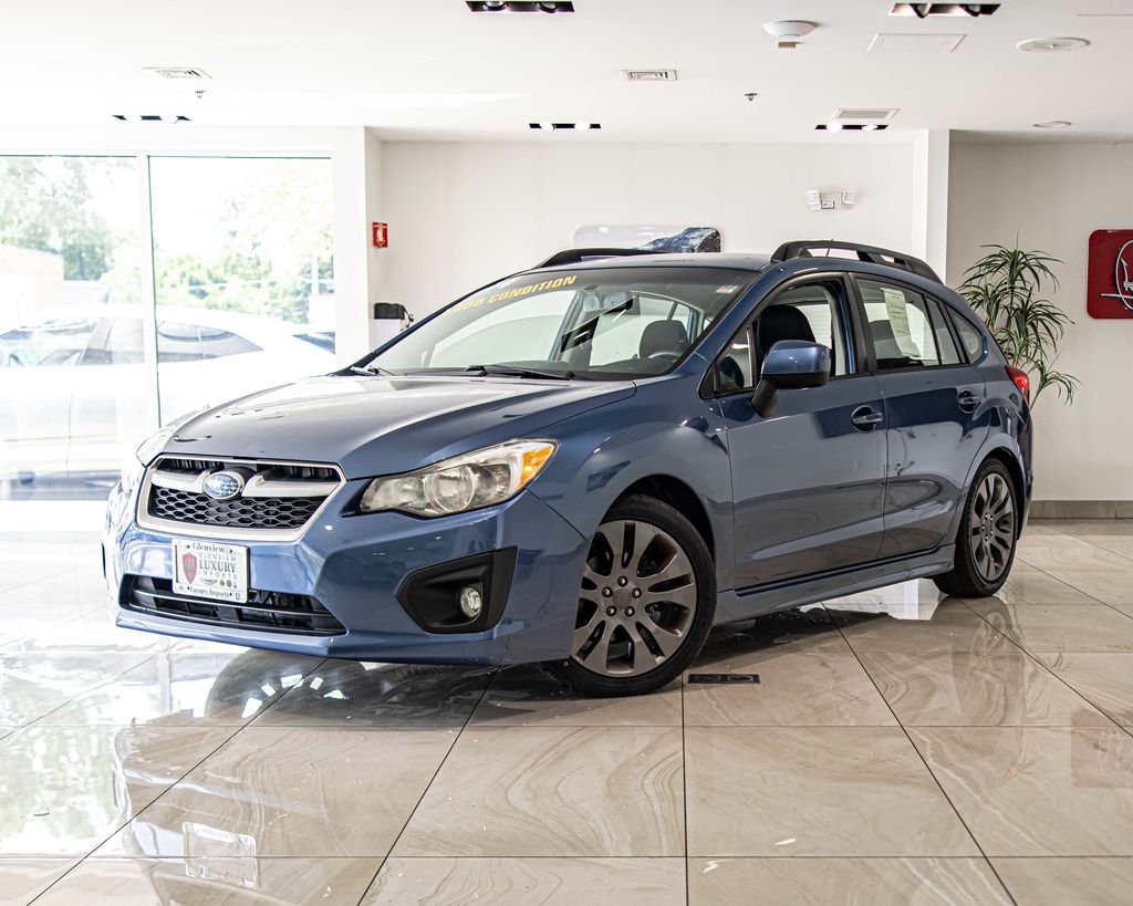 Used 2014 Blue Subaru 2.0i Sport Premium image 1