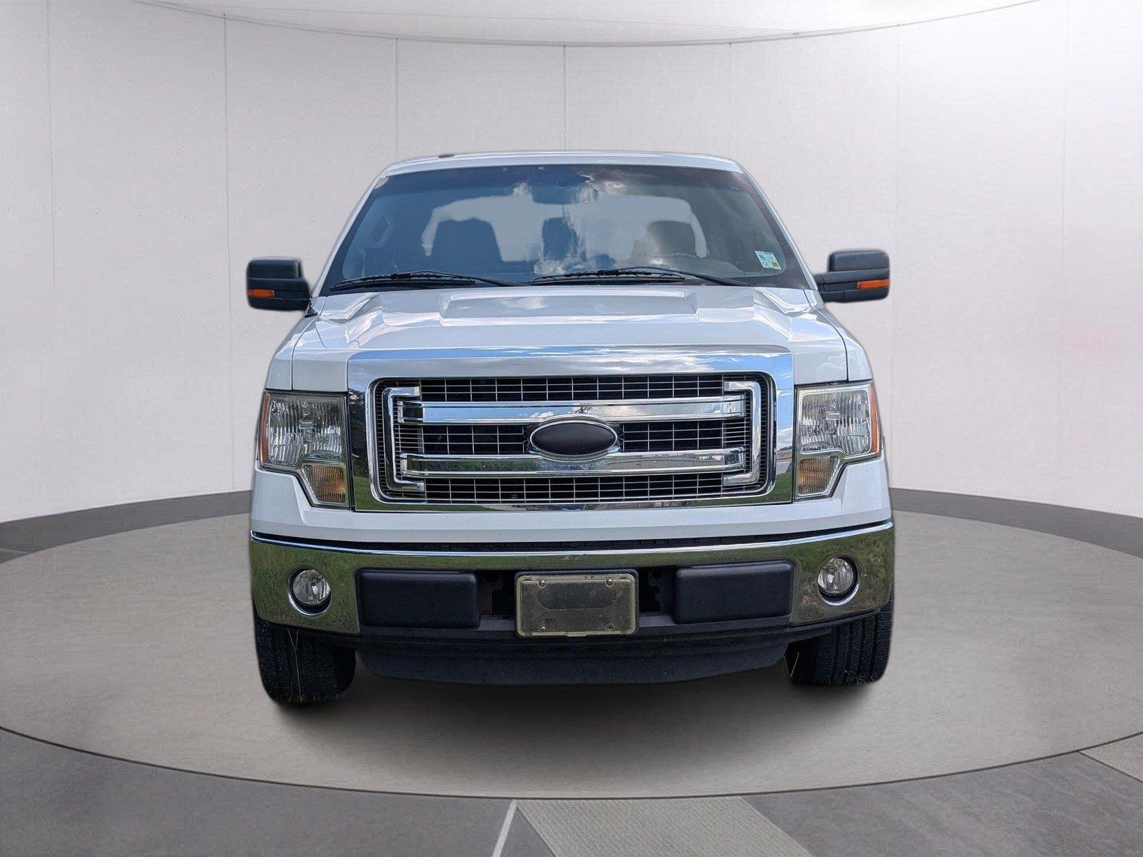 Used 2013 Oxford White/Ingot Silver Metallic Ford XLT image 10
