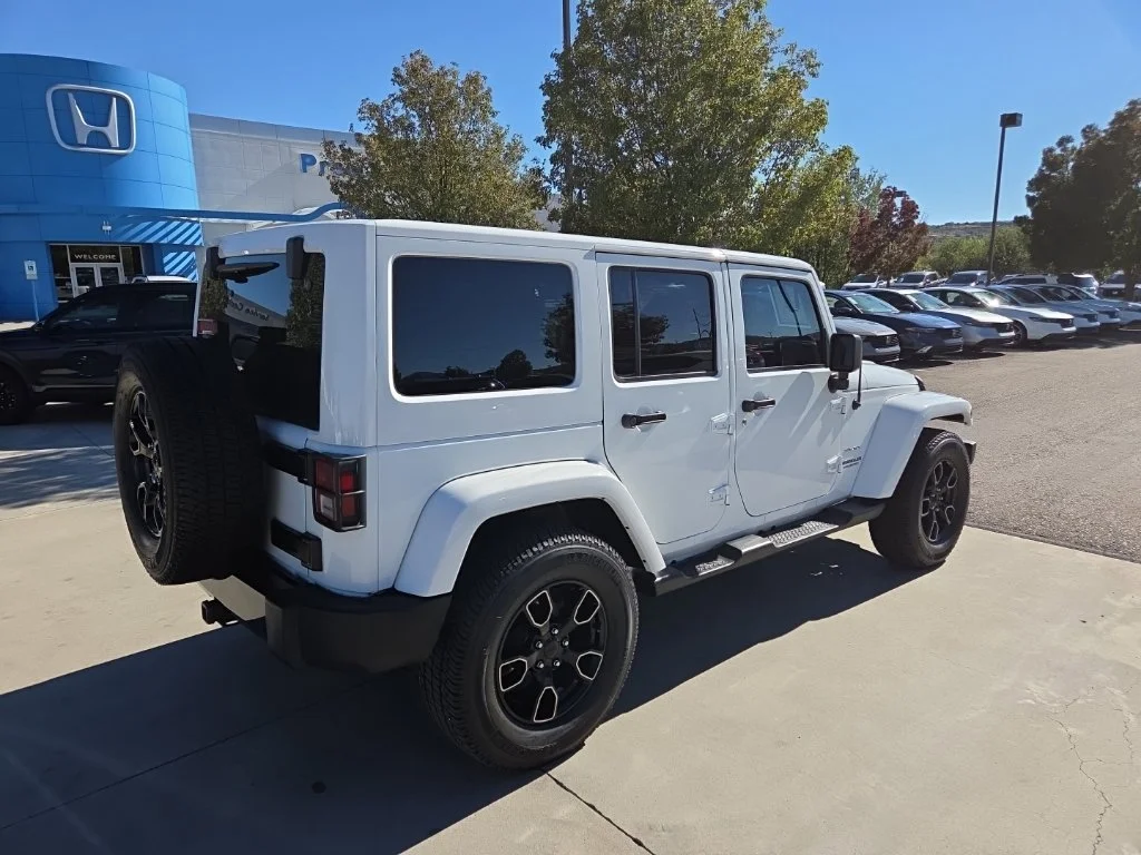 Used 2017 White Jeep Unlimited Sahara image 5
