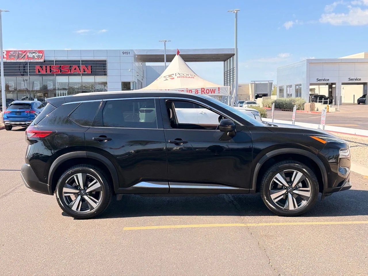 Used 2023 Super Black Nissan SL image 6