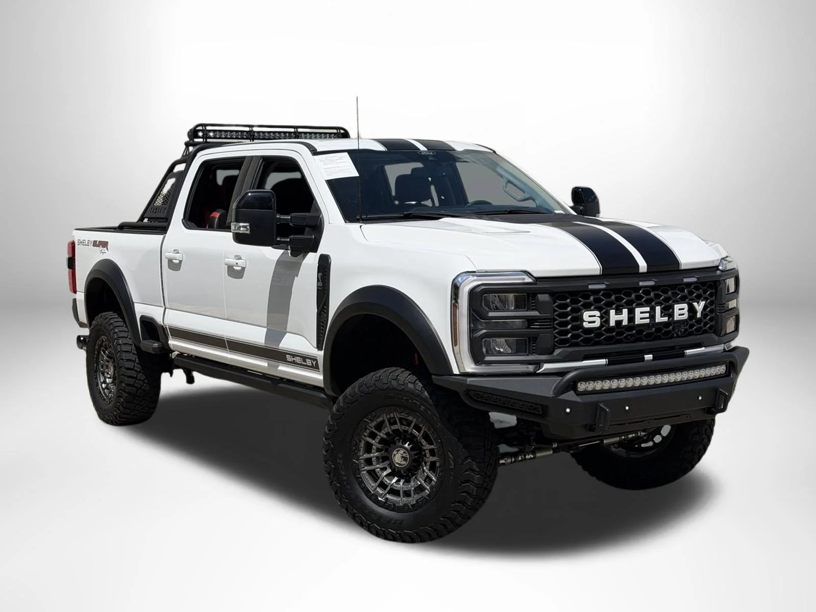 Used 2024 Oxford White Ford SuperCrew 4WD image 1