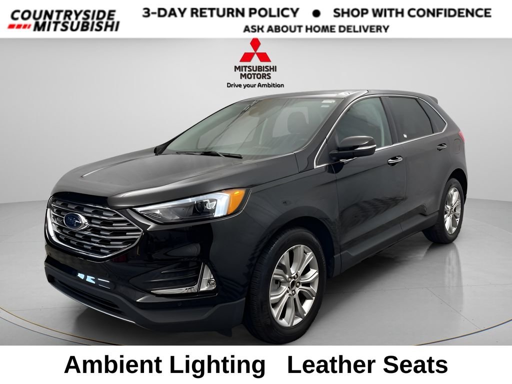 Used 2024 Black Metallic Ford Titanium AWD image 1