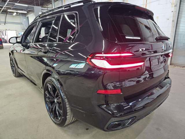 Used 2024 Black Sapphire Metallic BMW M60i image 2