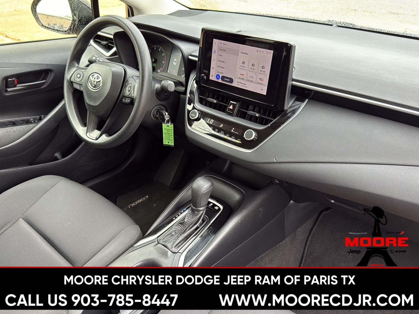 Used 2025 Midnight Black Metallic Toyota Hybrid LE image 30