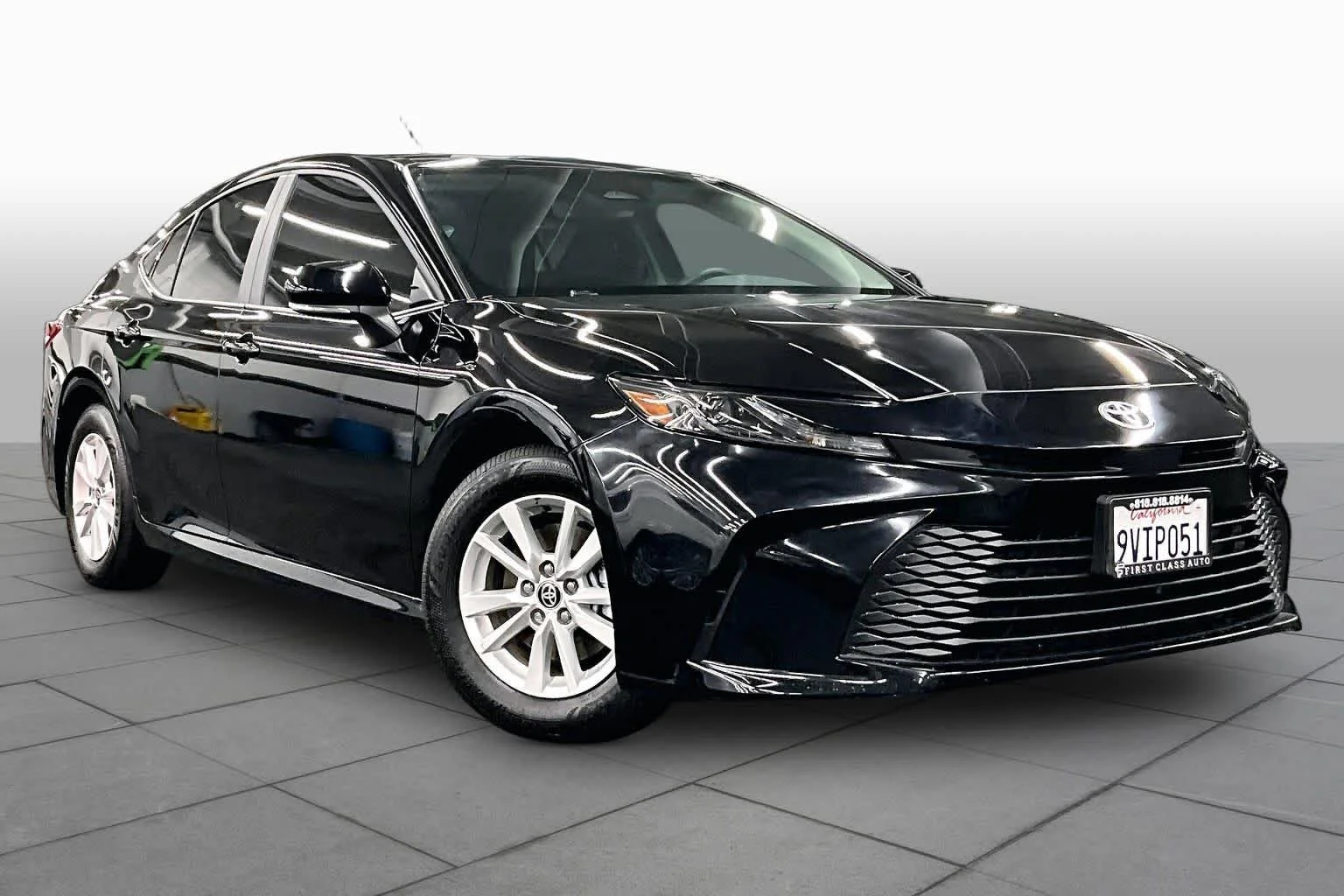 Used 2025 Midnight Black Metallic Toyota LE image 2