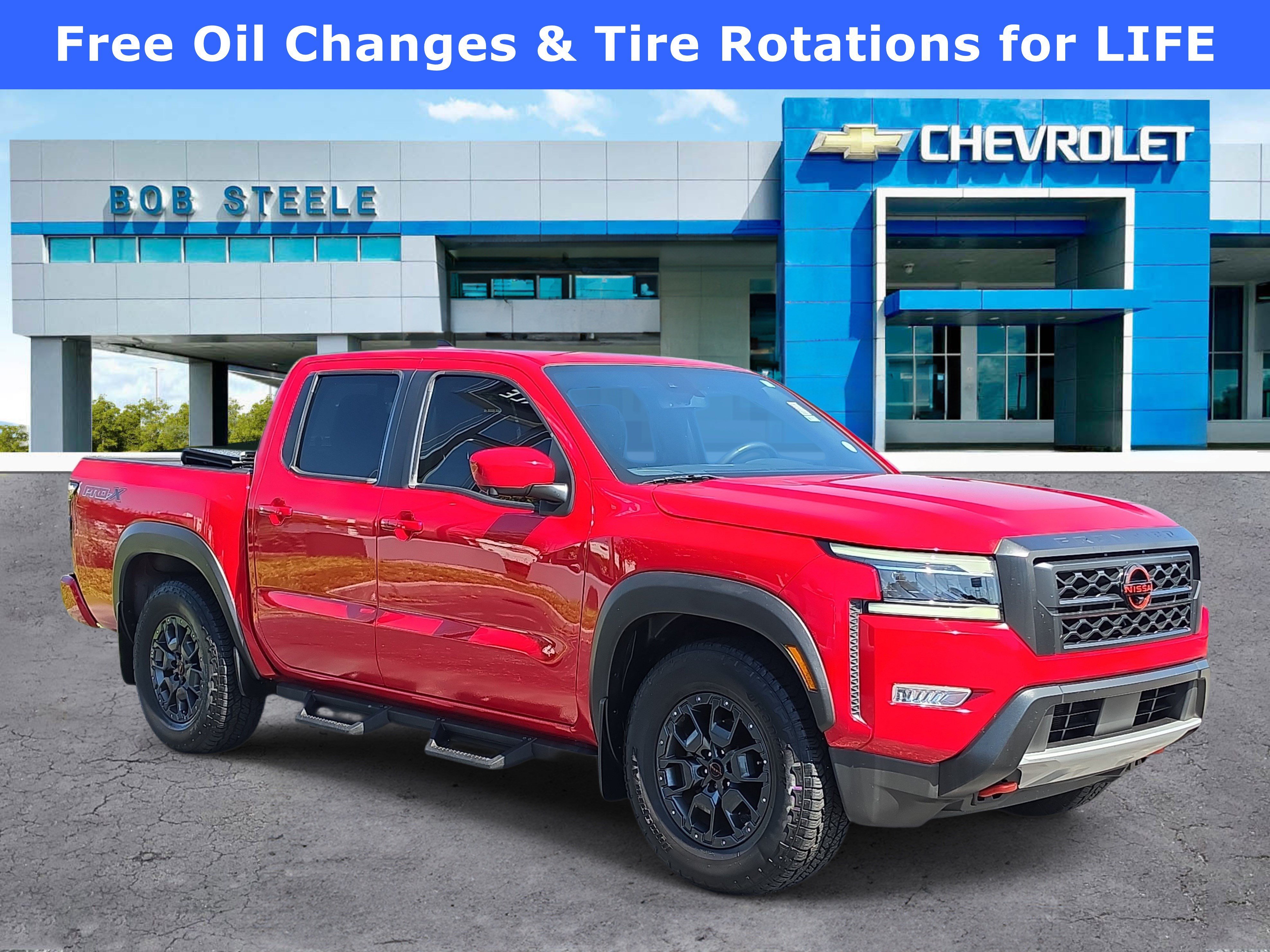 Used 2023 Red Nissan Crew Cab PRO-X 4x2 image 1