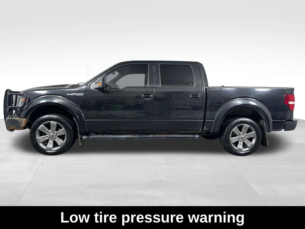 Used 2013 Black Ford FX4 image 6