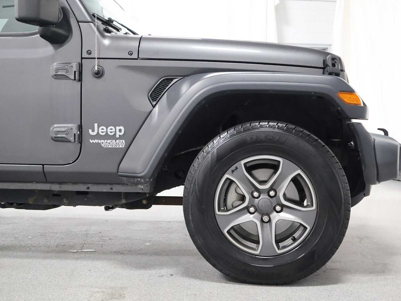 Used 2018 Granite Crystal Metallic Clearcoat Jeep Sport S image 11