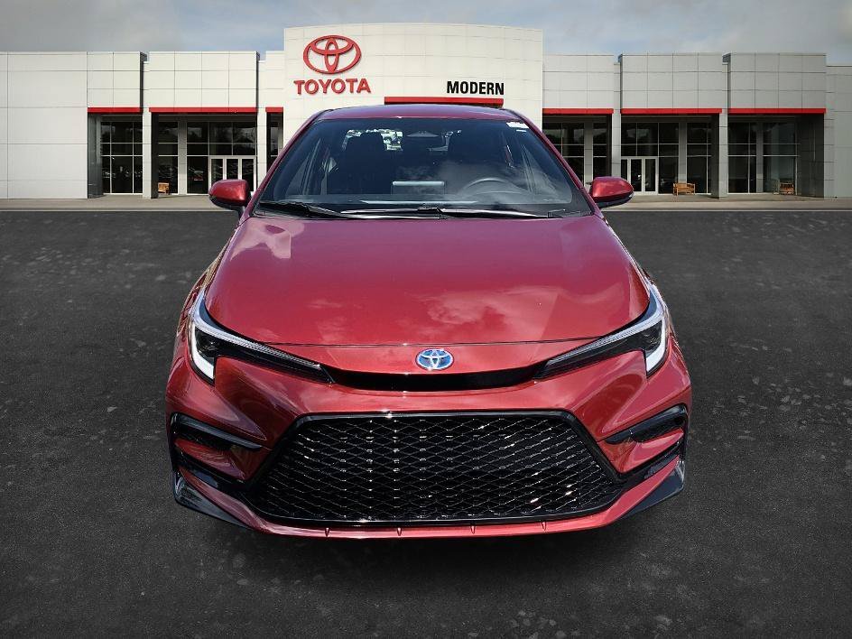 Certified Used 2025 Ruby Flare Pearl Toyota Hybrid SE image 2