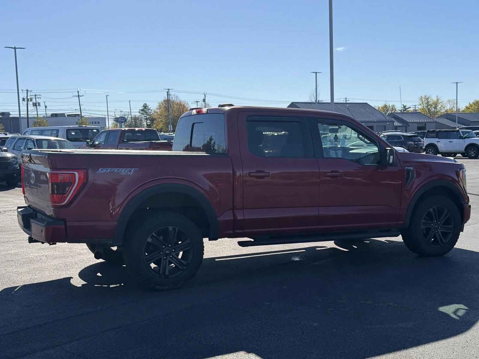 Used 2021 Rapid Red Metallic Tinted Clearcoat Ford XLT image 4