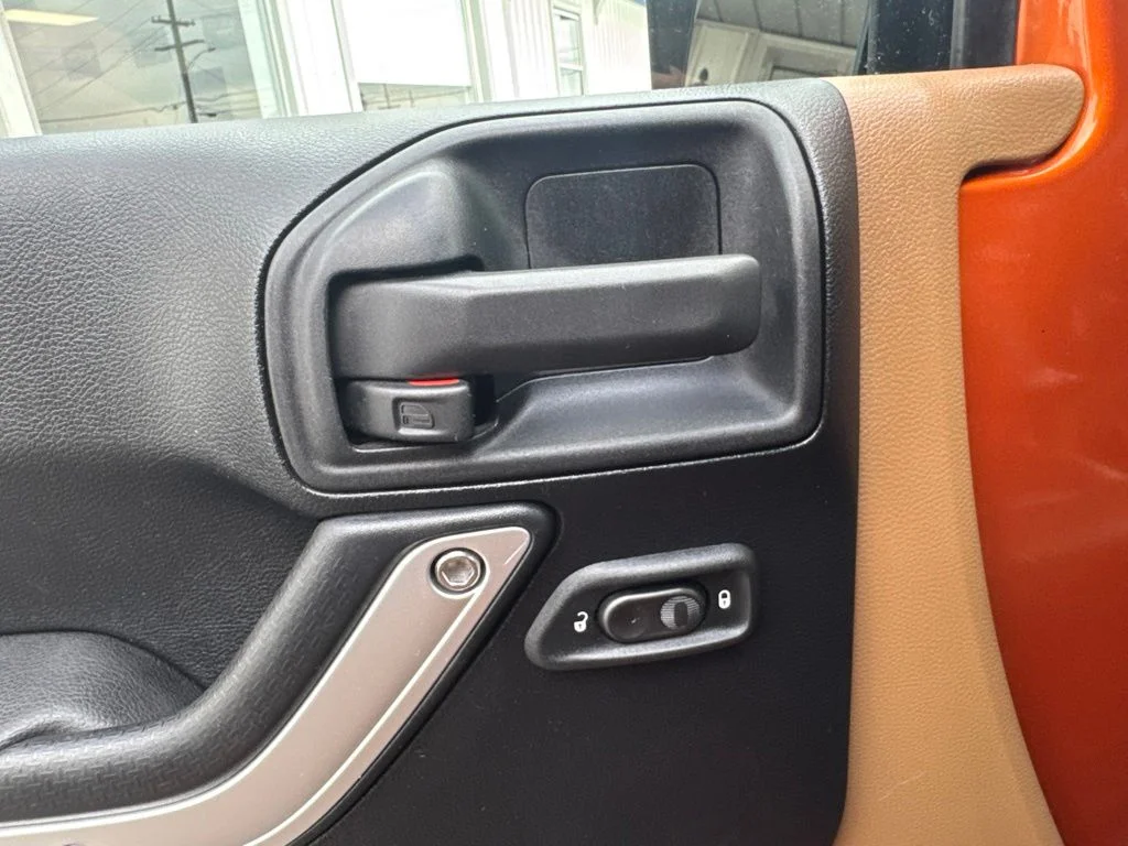 Used 2011 Orange Jeep Rubicon image 24