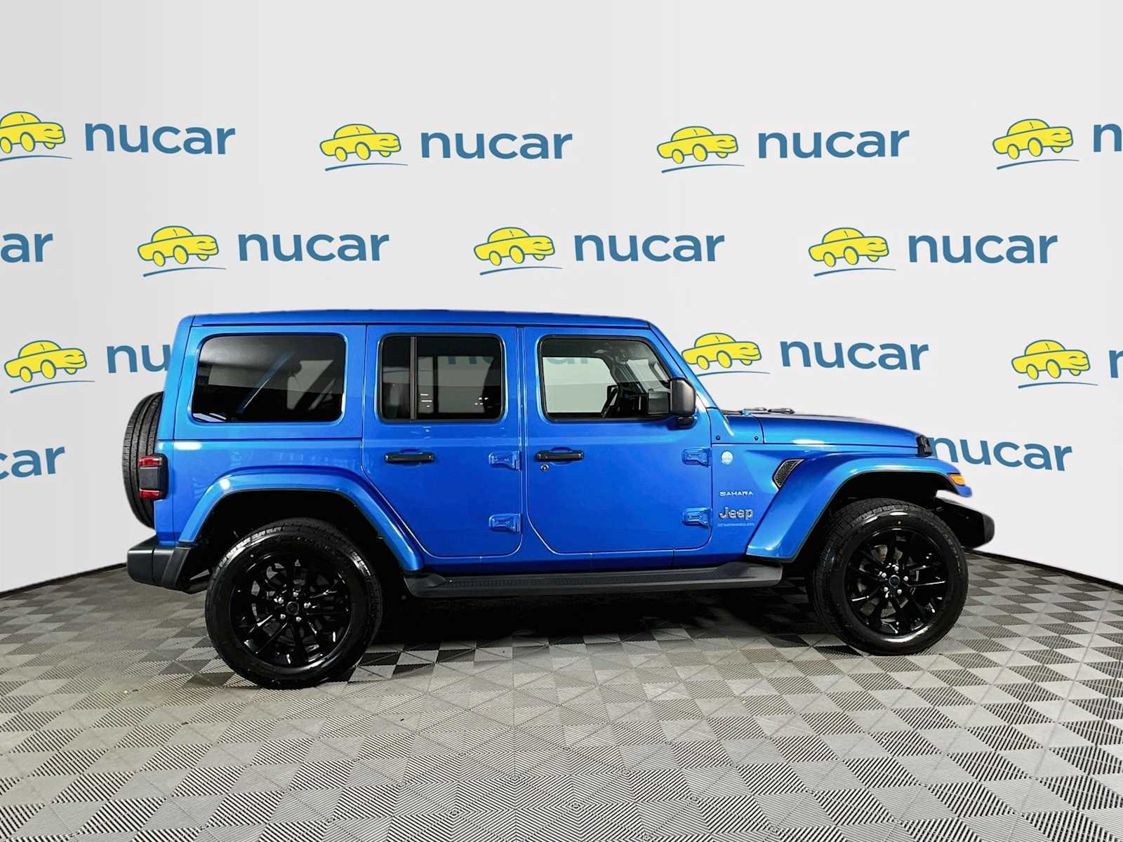 Used 2024 Hydro Blue Pearlcoat Jeep Sahara image 8