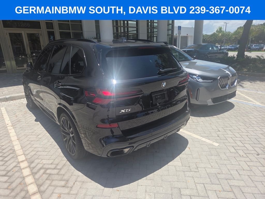 Certified Used 2026 Black Sapphire Metallic BMW sDrive40i image 13