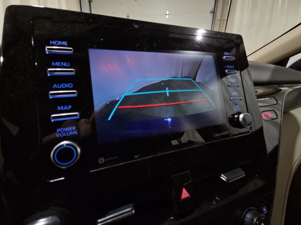 Used 2023 Reservoir Blue Toyota LE image 9