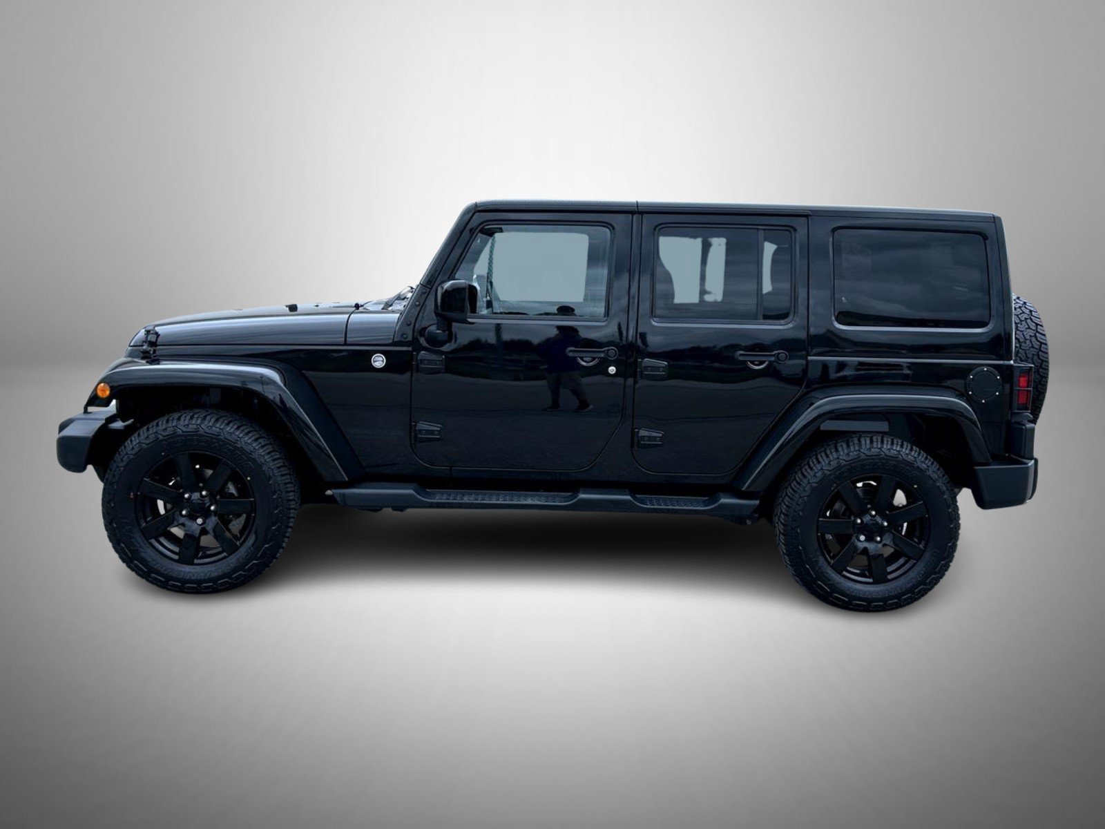 Used 2014 Black Jeep Unlimited Altitude image 14
