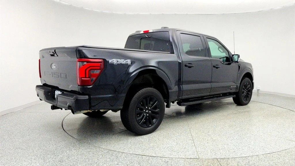 Used 2025 Agate Black Metallic Ford LARIAT 4WD SuperCrew 5.5