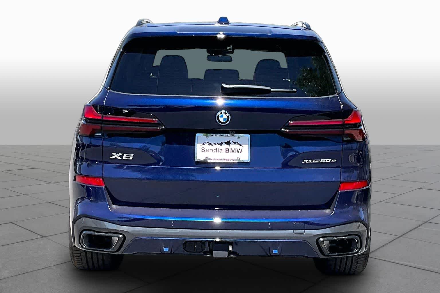 New 2026 Tanzanite Blue II Metallic BMW xDrive50e image 4