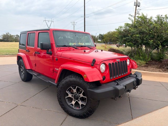 Used 2017 Red Jeep Unlimited Sahara image 7