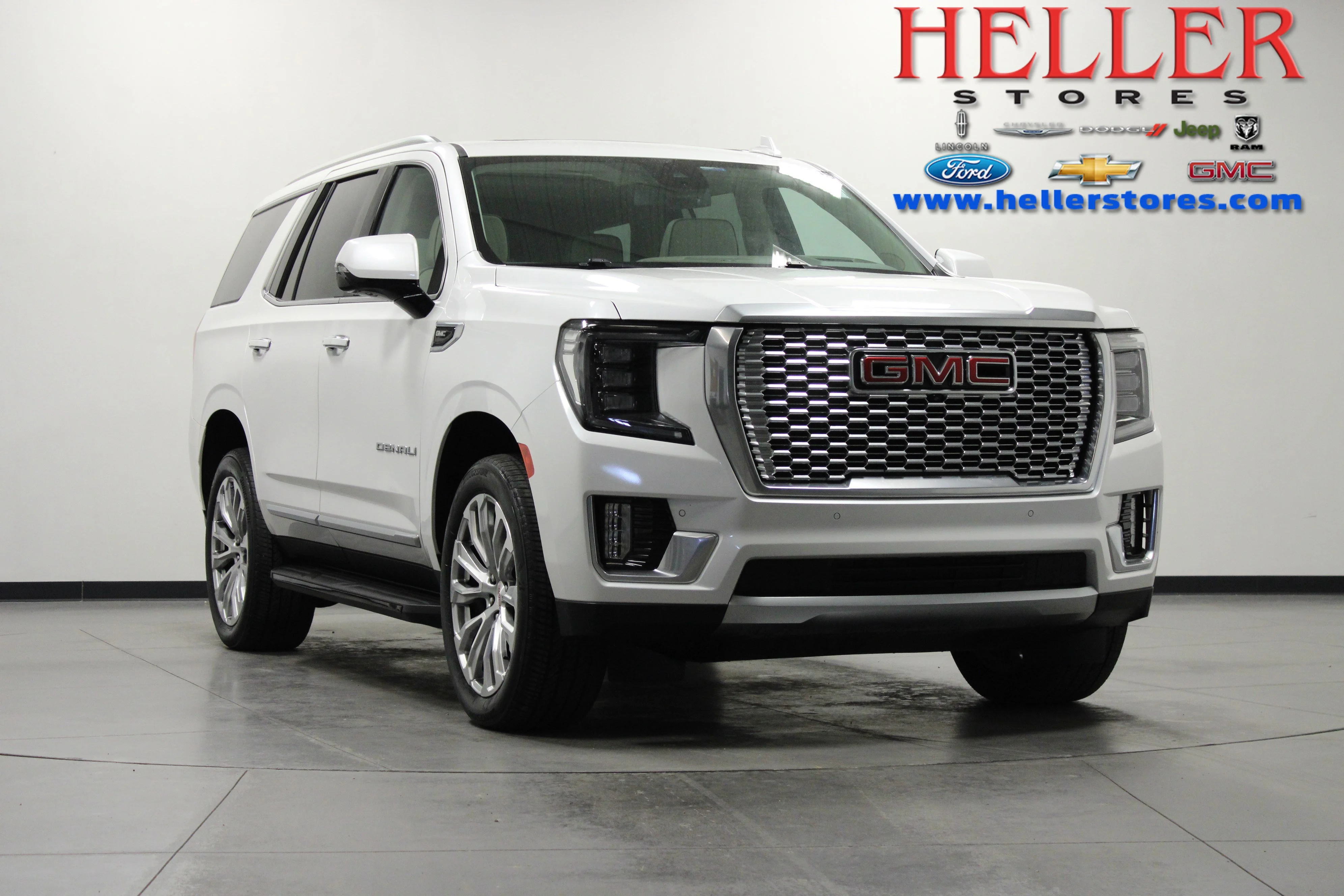 Used 2024 White Frost Tricoat GMC Denali image 1