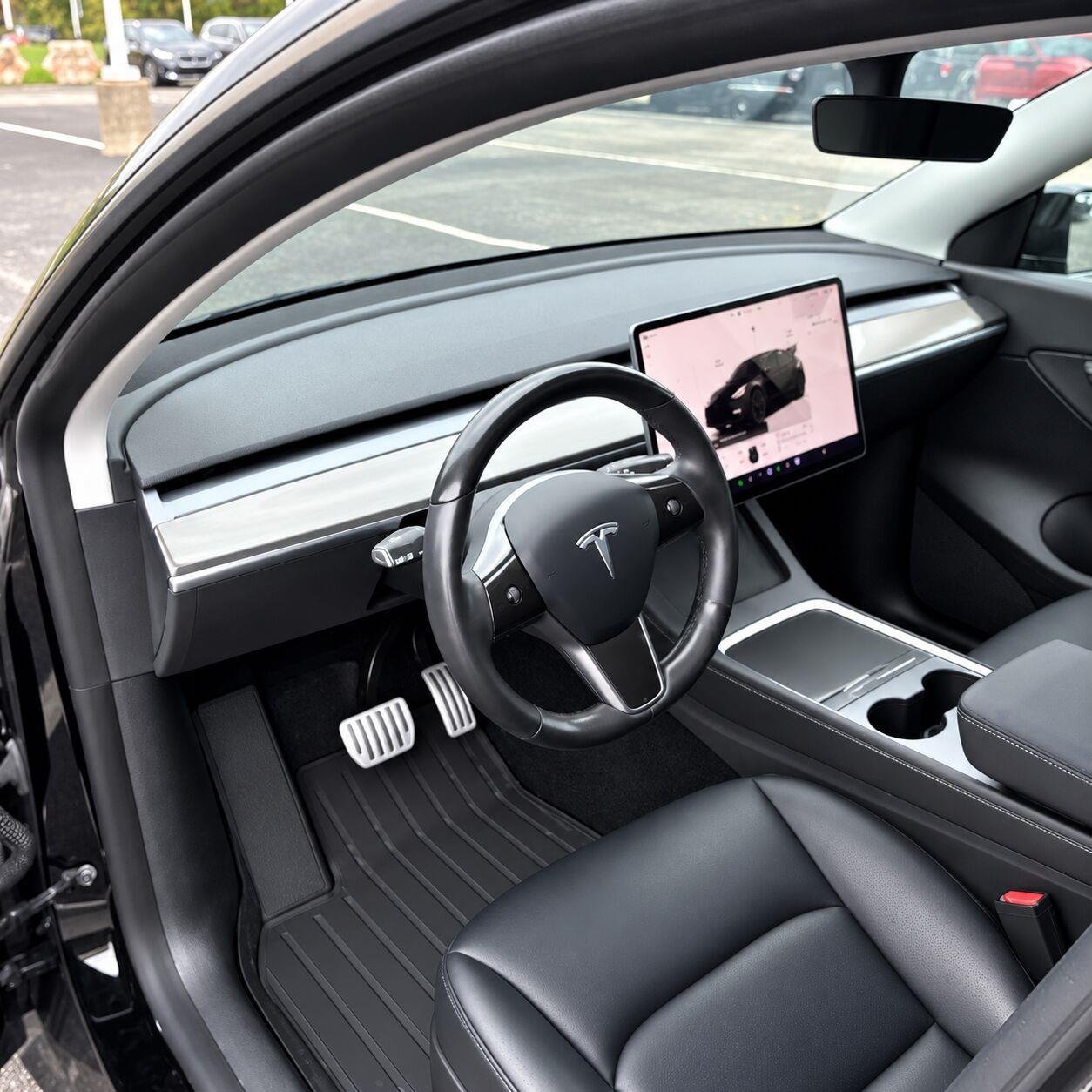 Used 2022 Solid Black Tesla Performance image 9