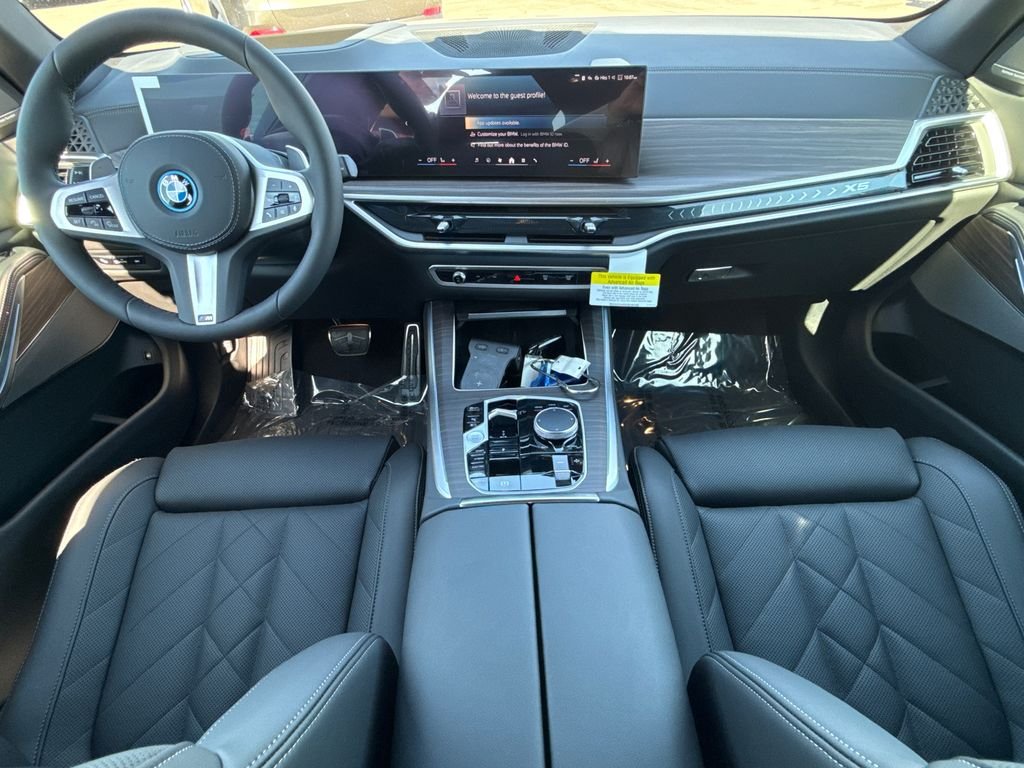 New 2026 Tanzanite Blue II Metallic BMW xDrive50e image 19